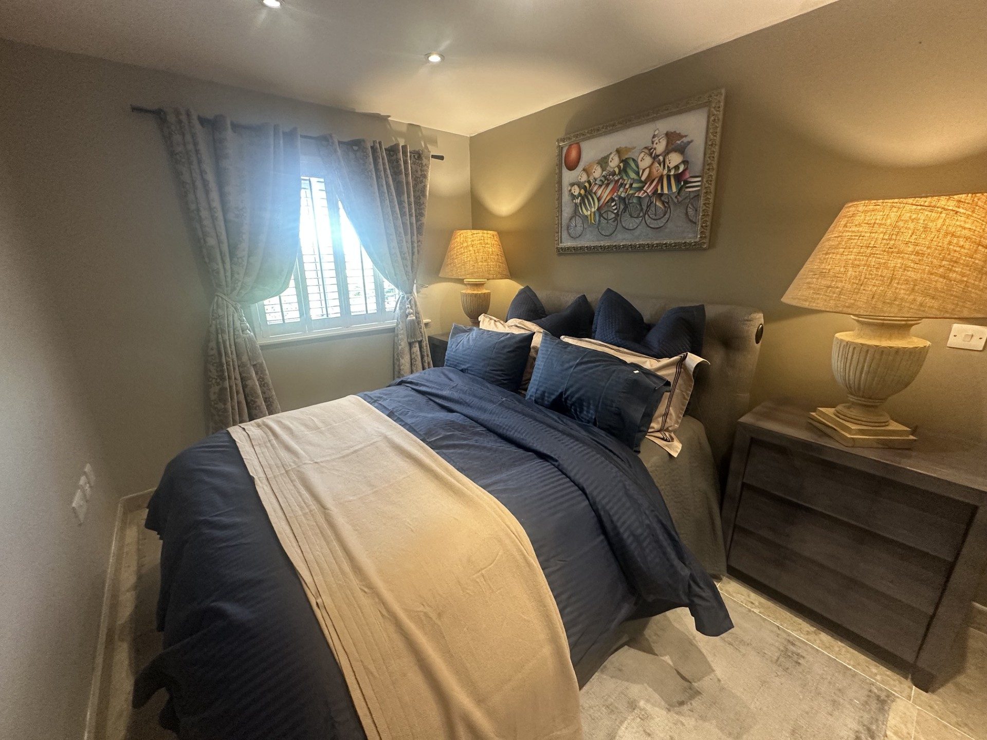 Second bedroom with navy bedding