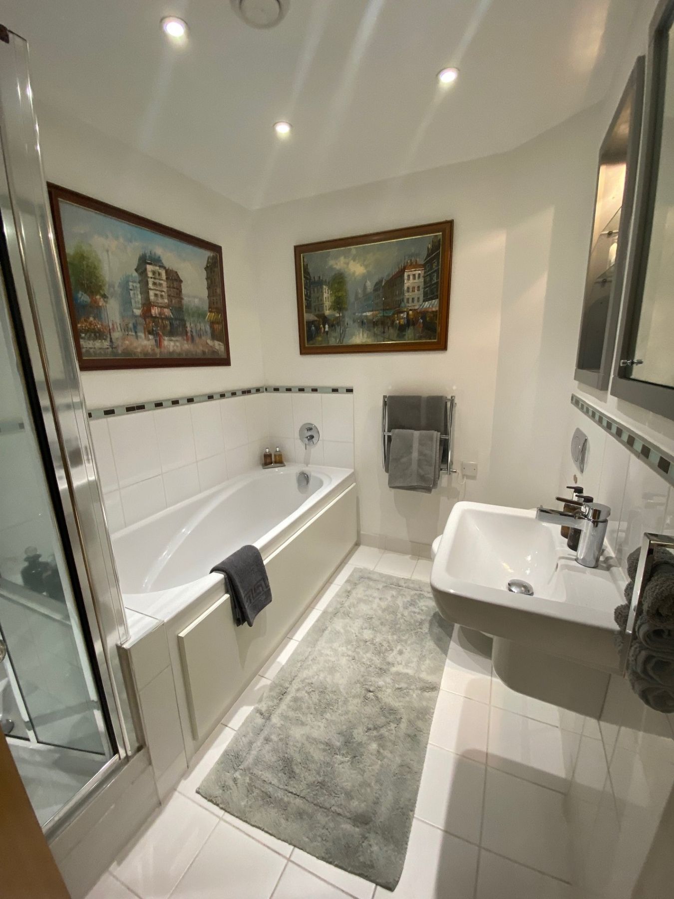 Second bathroom with bath and separate shower